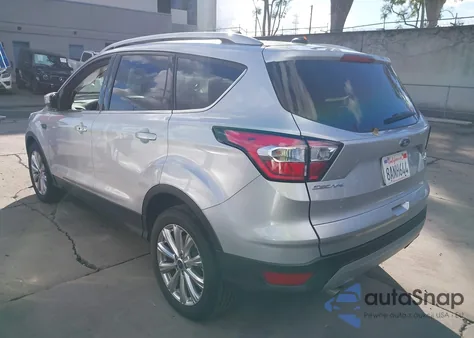 2017 Ford Escape Titanium from USA, damaged, VIN 1FMCU0J9XHUD85355